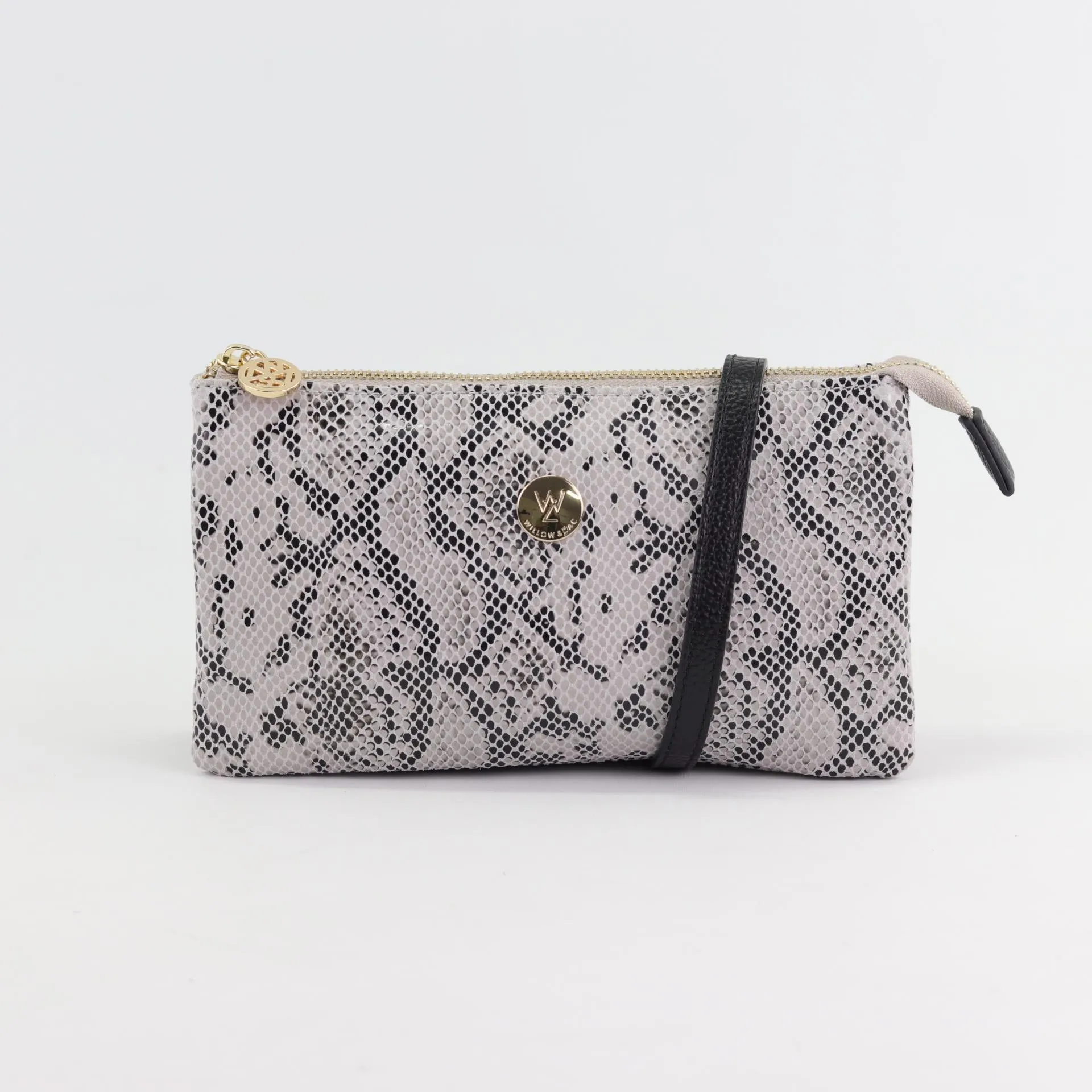 Evie printed suede clutch crossbody